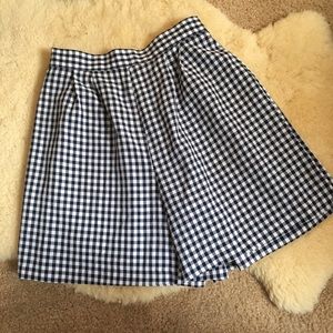 High waisted blue gingham shorts.